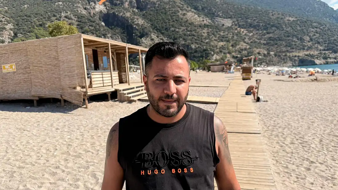 Fethiye’de şiddetli yağışların ardından tatilciler Belcekız’a akın etti