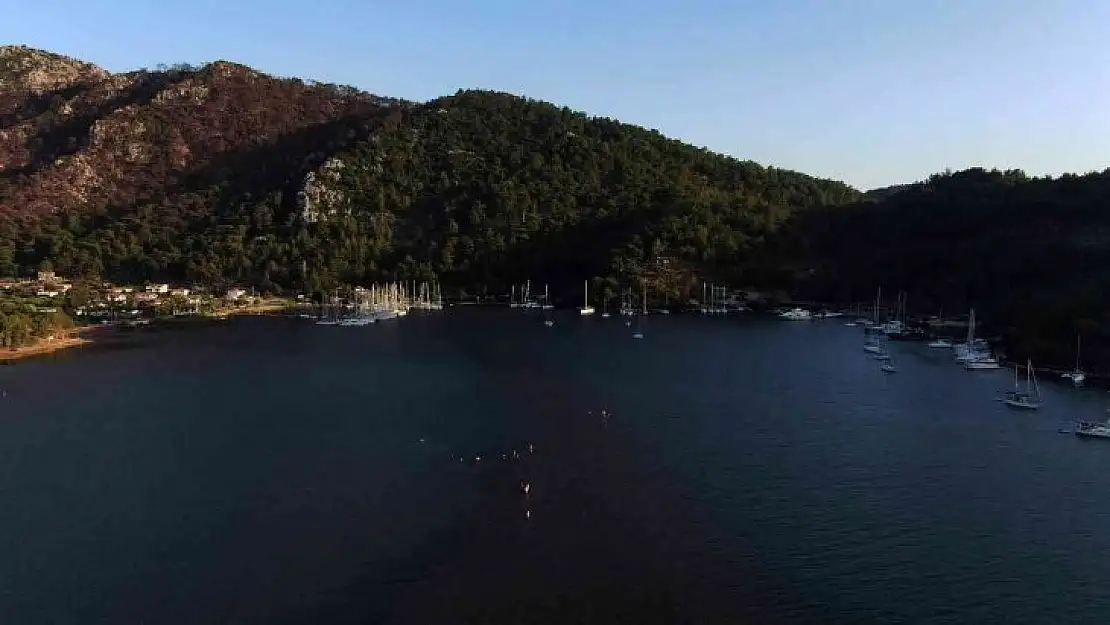 Marmaris'in dünyaca ünlü plajı Kızkumu ziyaretçi akınına uğruyor