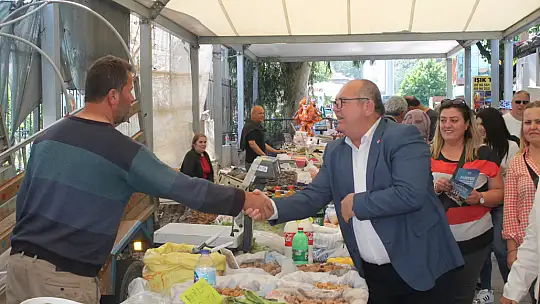 Aday Demir, pazar esnafıyla buluştu