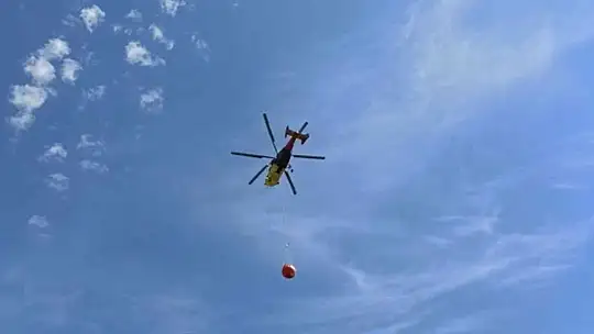 MARMARİS'TE UÇAK VE HELİKOPTERLERİN ART ARDA SORTİLERİ İLE YANGINA MÜDAHALE SÜRÜYOR