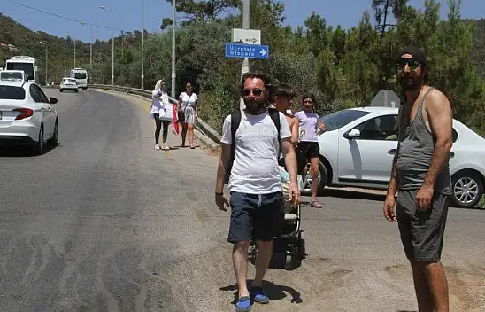 Ölüdeniz'e ulaşmak için kilometrelerce yürüdüler