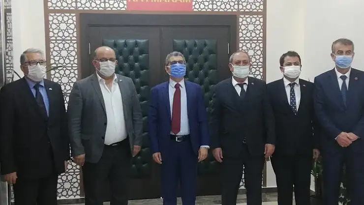 Seydikemer'de MHP'den ziyaretler